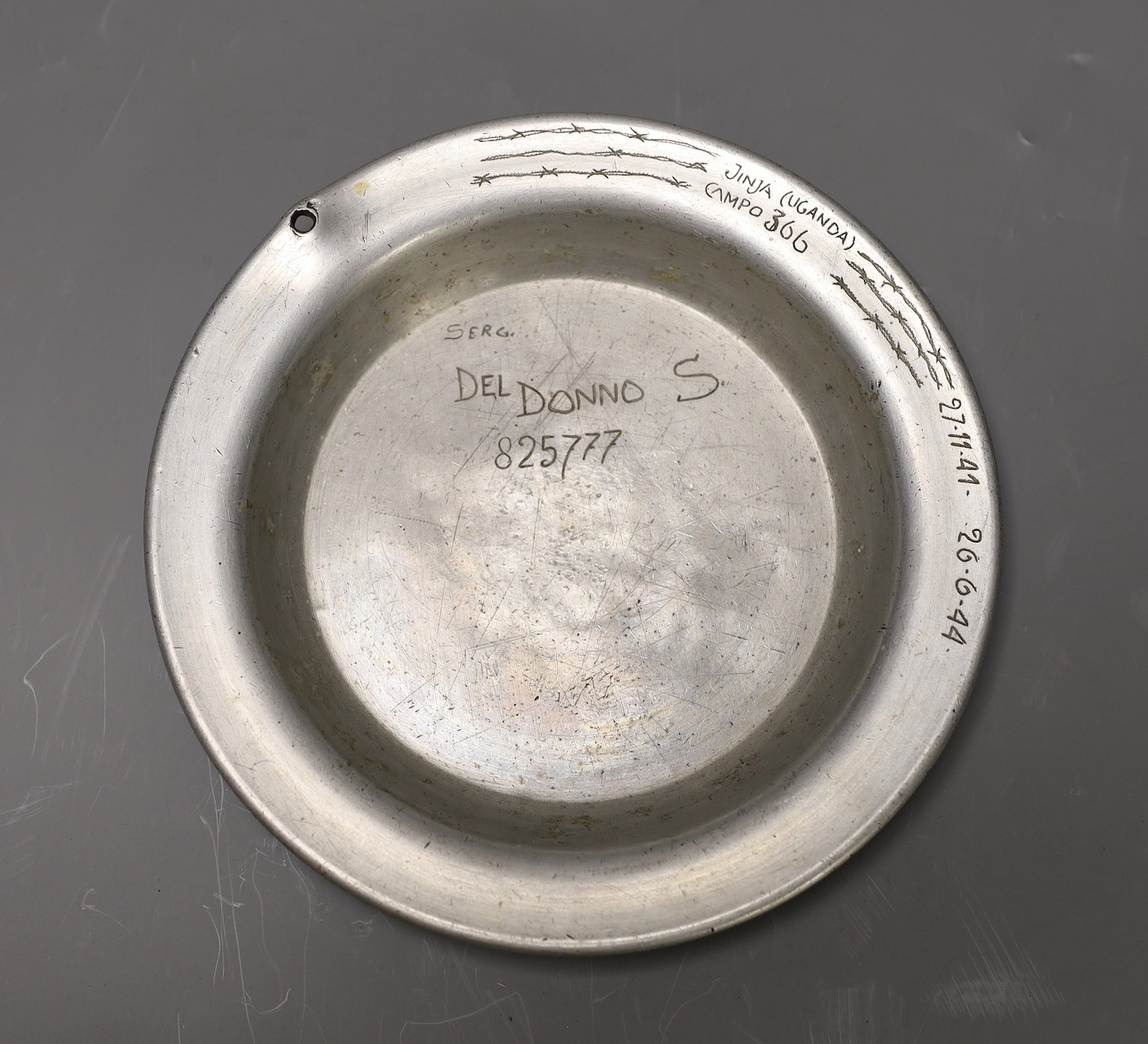 A WWII Italian prisoner of war decorated 'mess' plate, for Jinja, Camp 366, Uganda, 20cm diameter